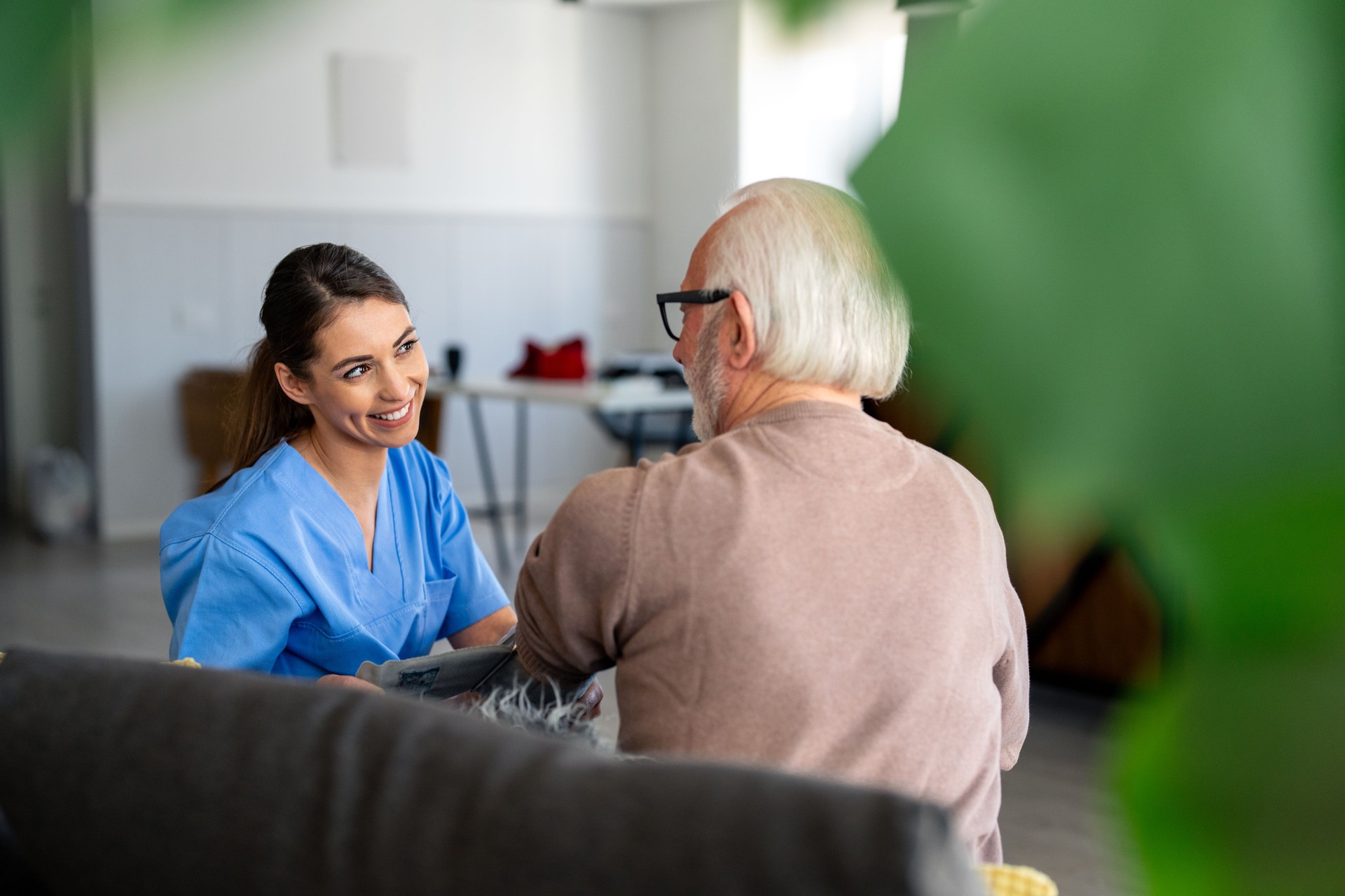 Compassionate Nurse Conducts Home Health Check